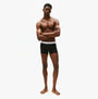 Tommy Hilfiger Mens 3 Pack Trunks Black front view worn by a model, showcasing comfort and style.