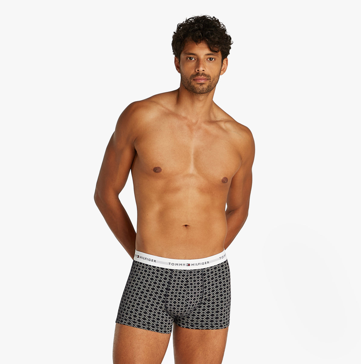 Tommy Hilfiger 3 Pack Mens Trunks Multicoloured, front view model wearing trunks with TH repeat logo waistband.