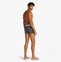Tommy Hilfiger 3 Pack Mens Trunks Multicoloured back view on model showcasing the elasticated waistband and printed design.