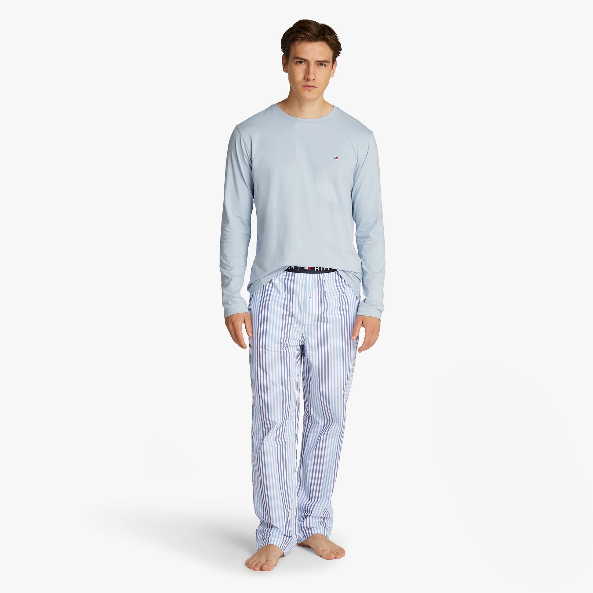 Tommy Hilfiger TH ORIGINAL Mens Long Sleeve Pyjama Set Breezy Blue / Twill Stripes front view model wearing pyjama set