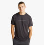 Tommy Hilfiger ORIGINAL LOGO Mens T Shirt Dark Ash front view worn by a model, showcasing crew neck and flag embroidery.