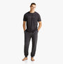 Tommy Hilfiger ORIGINAL LOGO Mens T Shirt Dark Ash front view worn with matching pants, showcasing comfort and lightweight cotton.