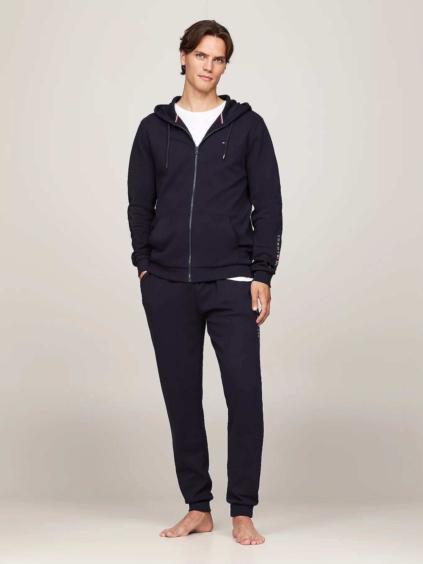 Tommy Hilfiger ORIGINAL LOGO Mens Full Zip Hoodie Desert Sky front view model wearing hoodie and matching pants