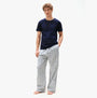 Tommy Hilfiger 3P SS TEE Mens T-Shirts & Tank Tops Multicoloured front view with model wearing navy t-shirt and plaid pants.