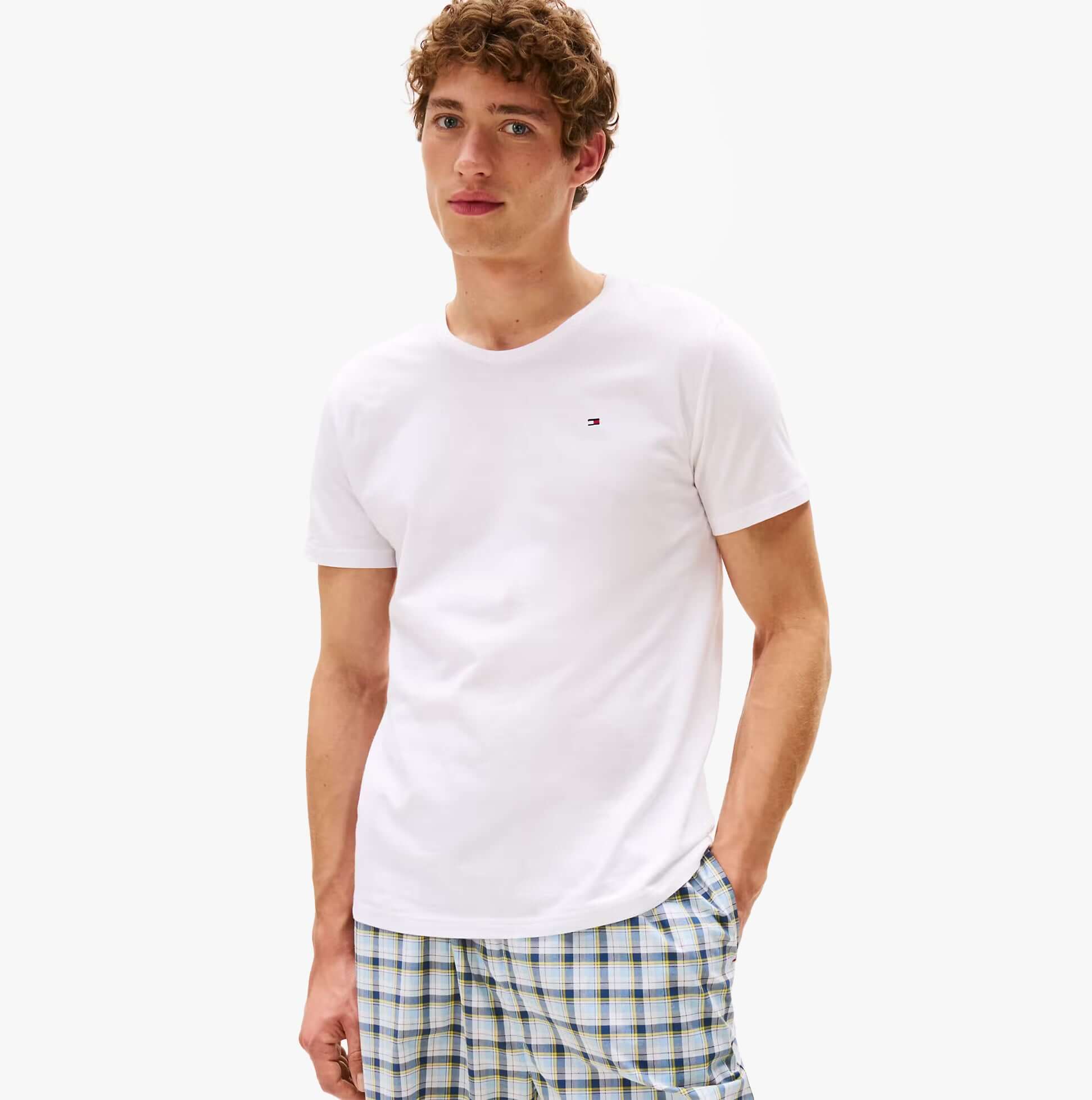 Tommy Hilfiger 3P SS TEE Mens T-Shirts & Tank Tops Multicoloured front view model wearing white t-shirt and checkered shorts.