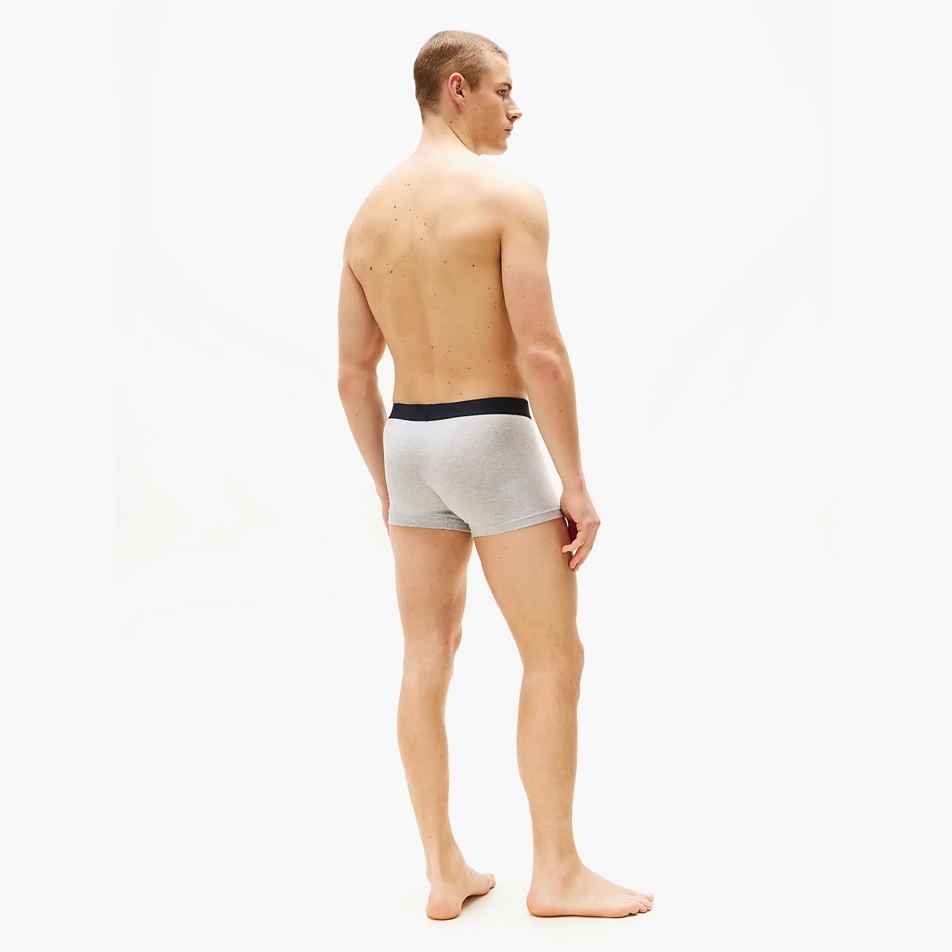 Tommy Hilfiger TRUNK 3 Pack Mens Trunk Multicoloured back view on model, showcasing elasticated waistband.