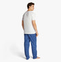 Tommy Hilfiger COLOUR BLOCKED Mens T-Shirt Optic White back view with blue plaid pajama pants.