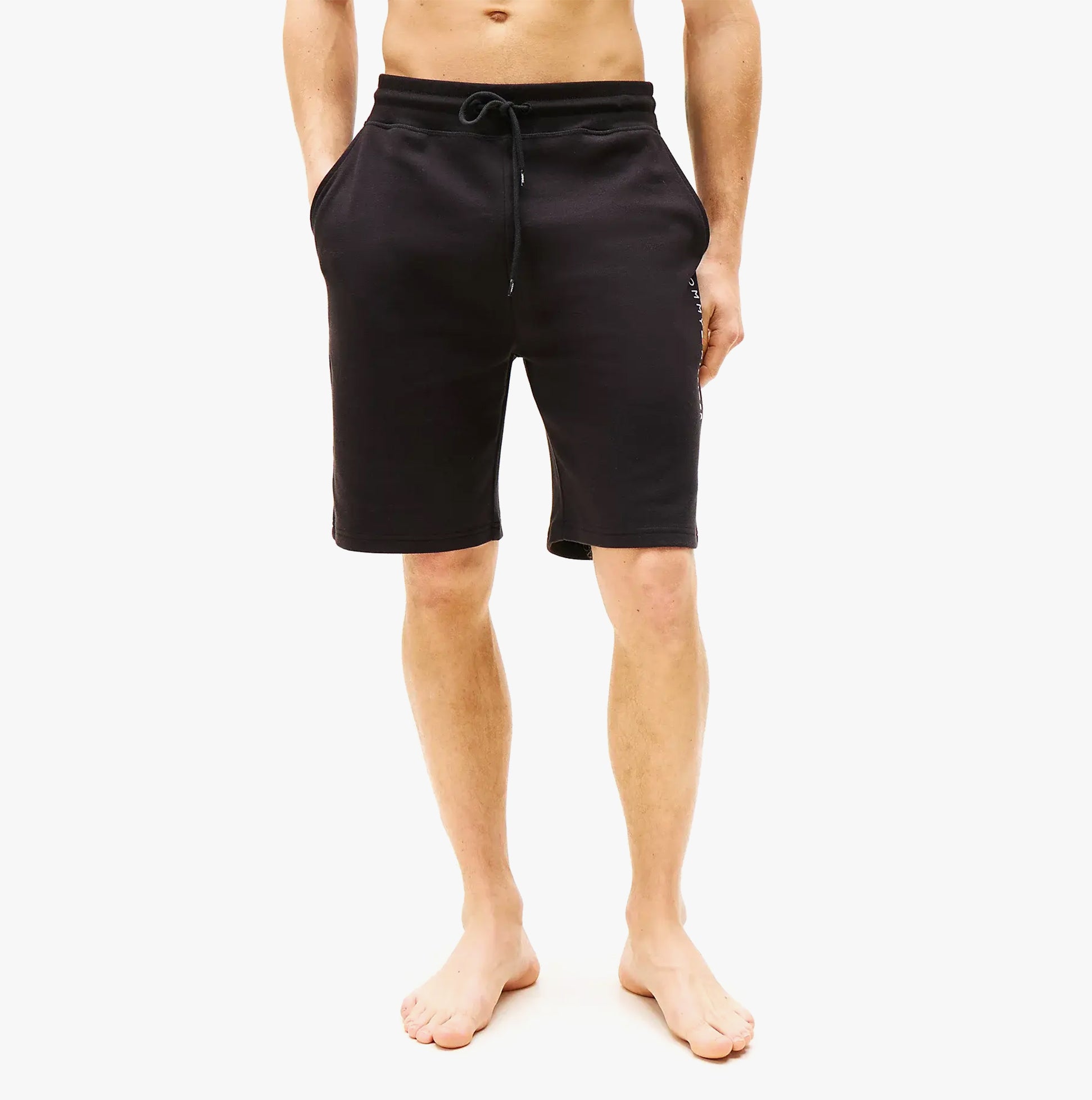 Tommy Hilfiger Mens Lounge Shorts Black front view on model, showcasing the comfortable fit and stylish design.