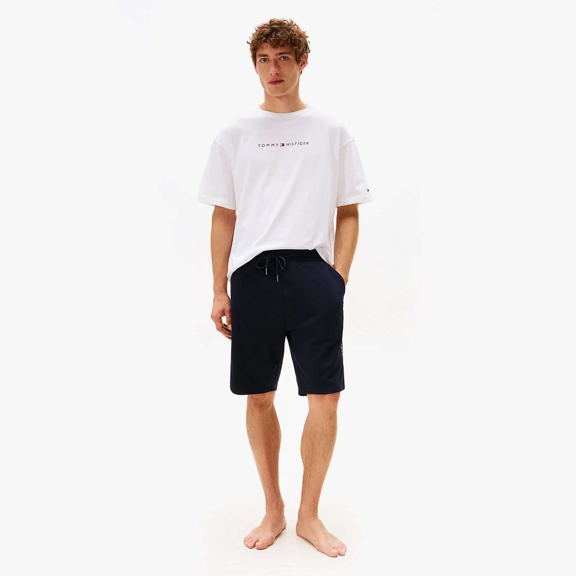 Tommy Hilfiger Mens TH Original Logo Terry Lounge Shorts Navy front view worn by model.