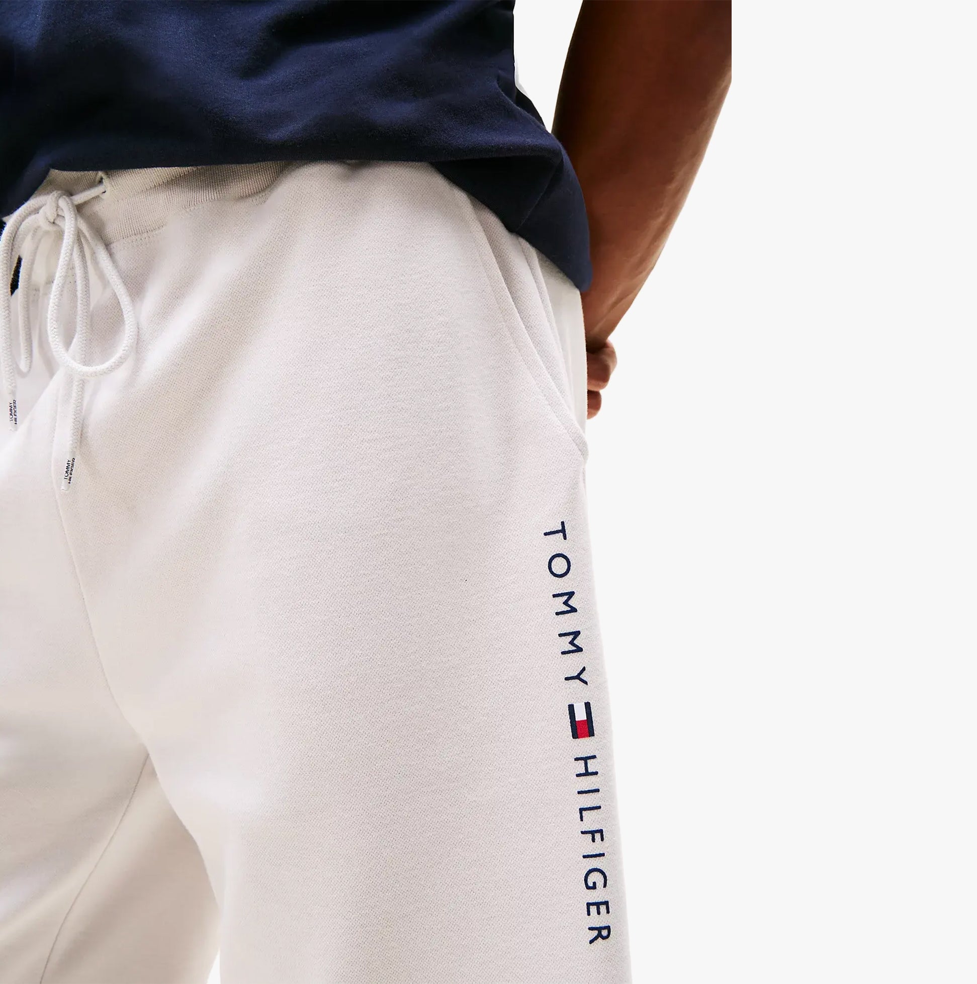 Tommy Hilfiger Mens Lounge Shorts Beige detail view showcasing logo and fabric texture.