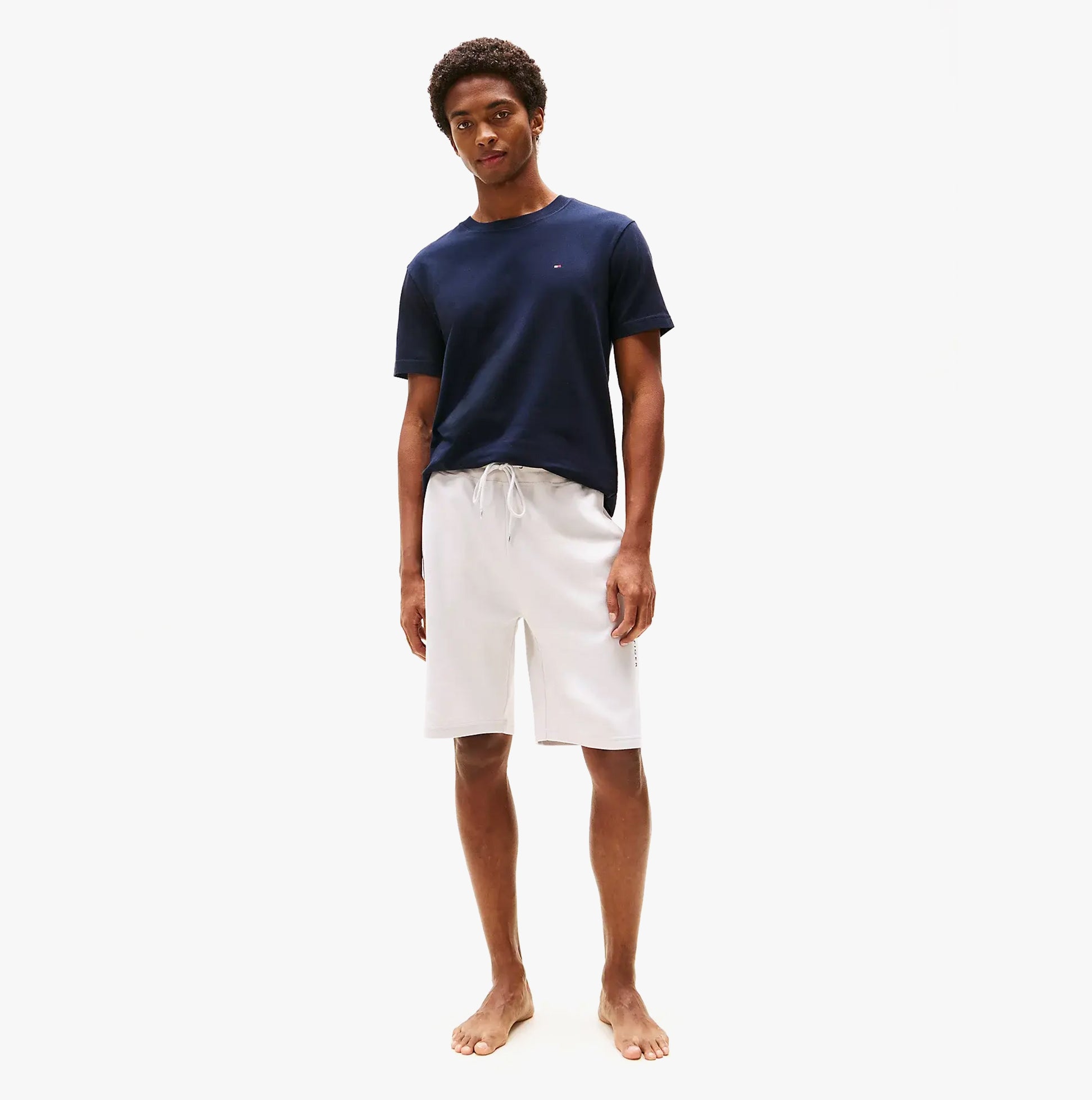 Tommy Hilfiger Mens Lounge Shorts Beige front view on model, featuring casual style and relaxed fit.