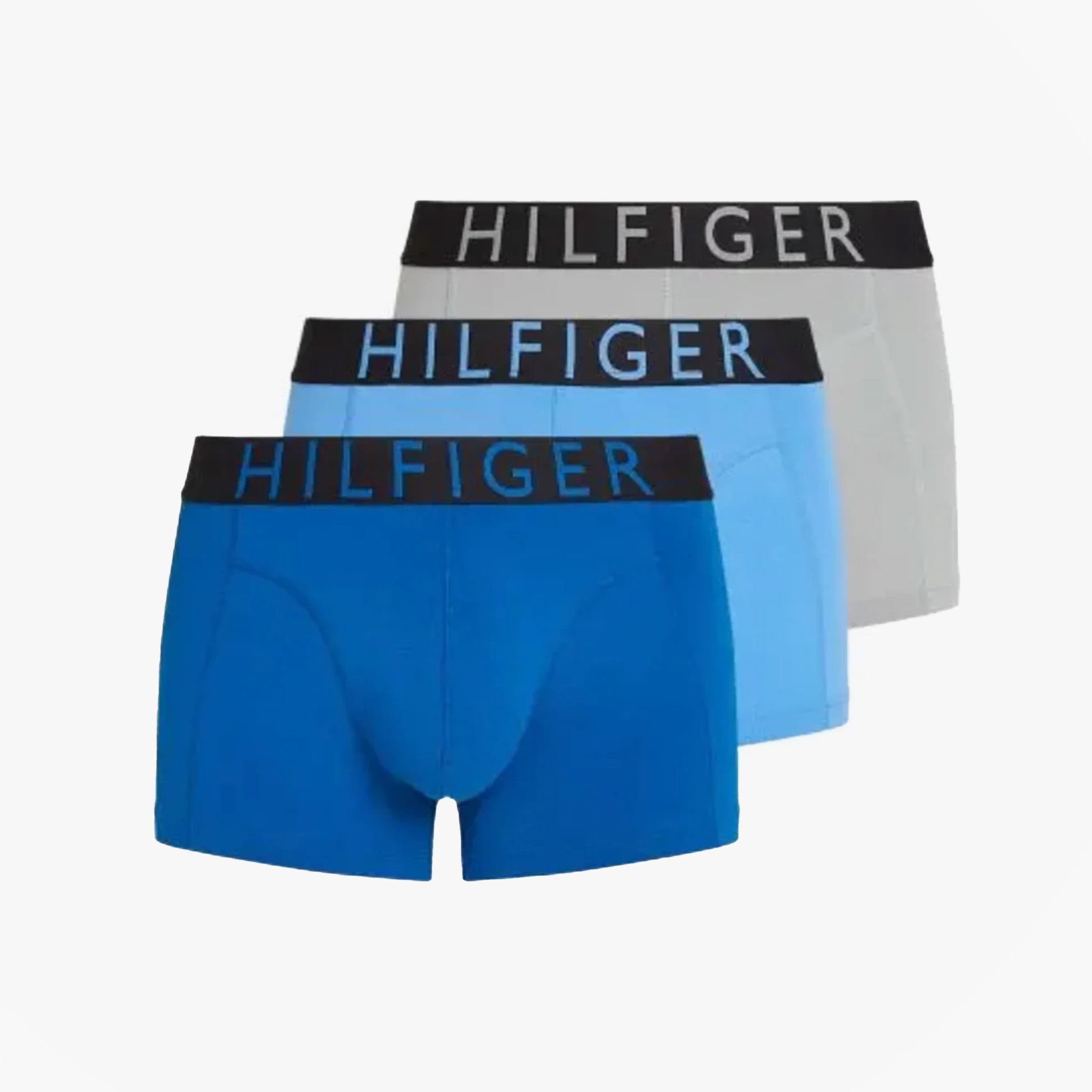 Tommy Hilfiger TRUNK 3 Pack Mens Trunk Multicoloured side view displaying three trunks in blue tones and contrasting logo waistbands.