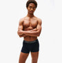 Tommy Hilfiger Mens 3 Pack Logo Waistband Trunks Multi side view on model wearing navy trunks with logo waistband.