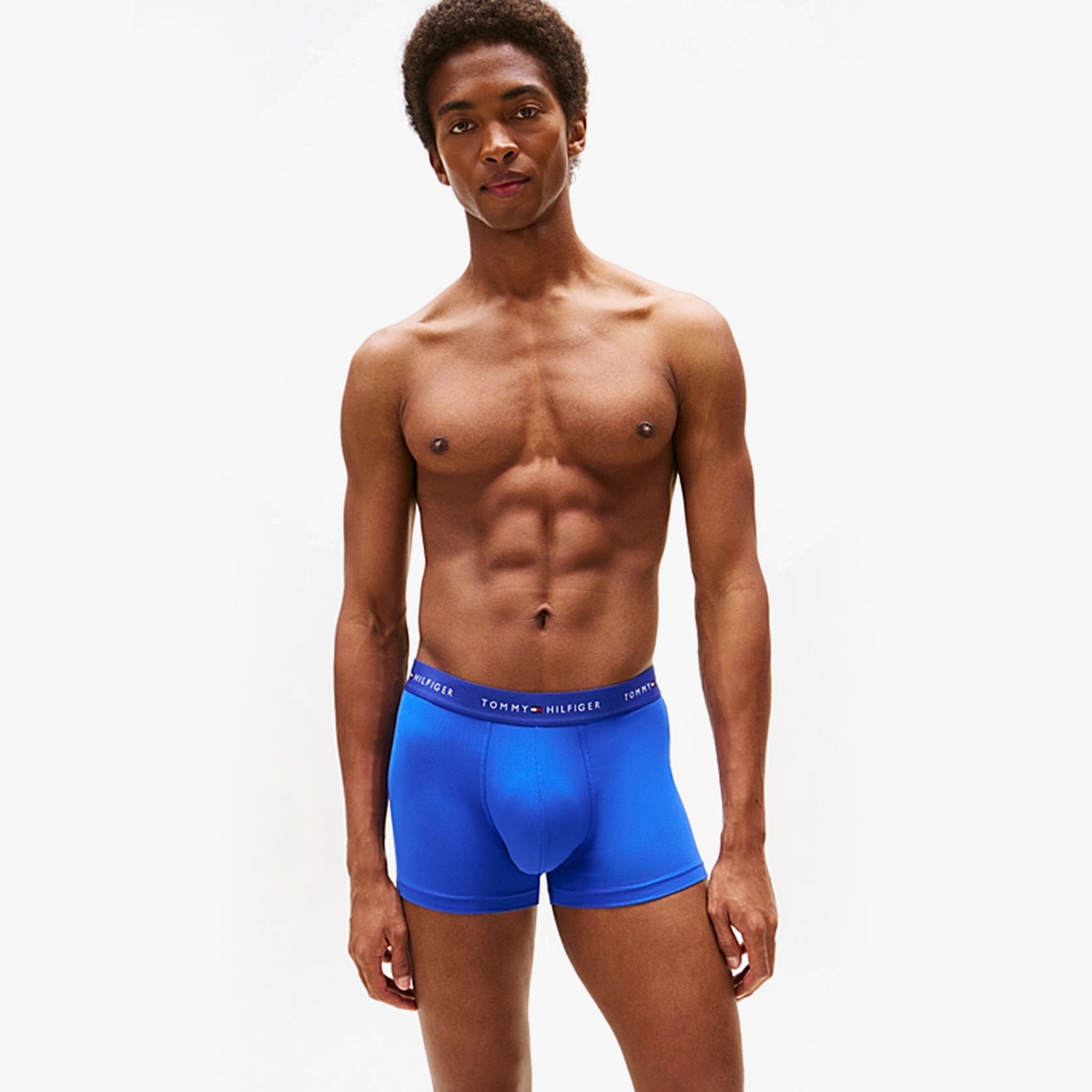 Tommy Hilfiger 3-Pack Signature Mens Microfibre Trunks Multicoloured in blue, side view showing fit and waistband logo.