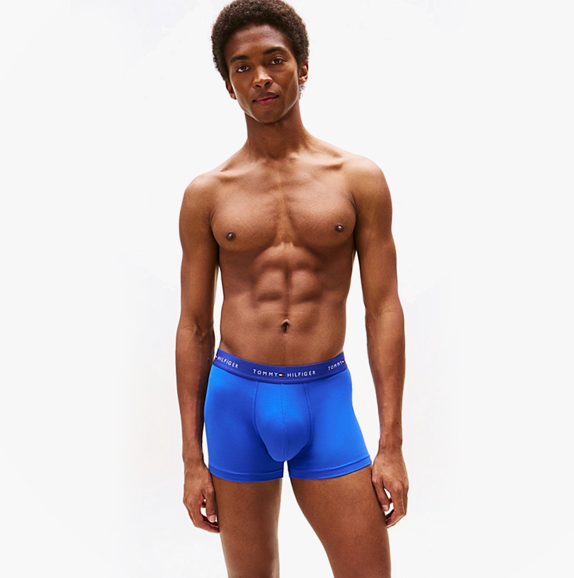 Tommy Hilfiger 3-Pack Signature Mens Microfibre Trunks Multicoloured in blue, side view showing fit and waistband logo.
