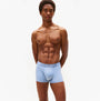 Tommy Hilfiger 3-Pack Signature Mens Microfibre Trunks Multicoloured front view on model wearing light blue trunks.