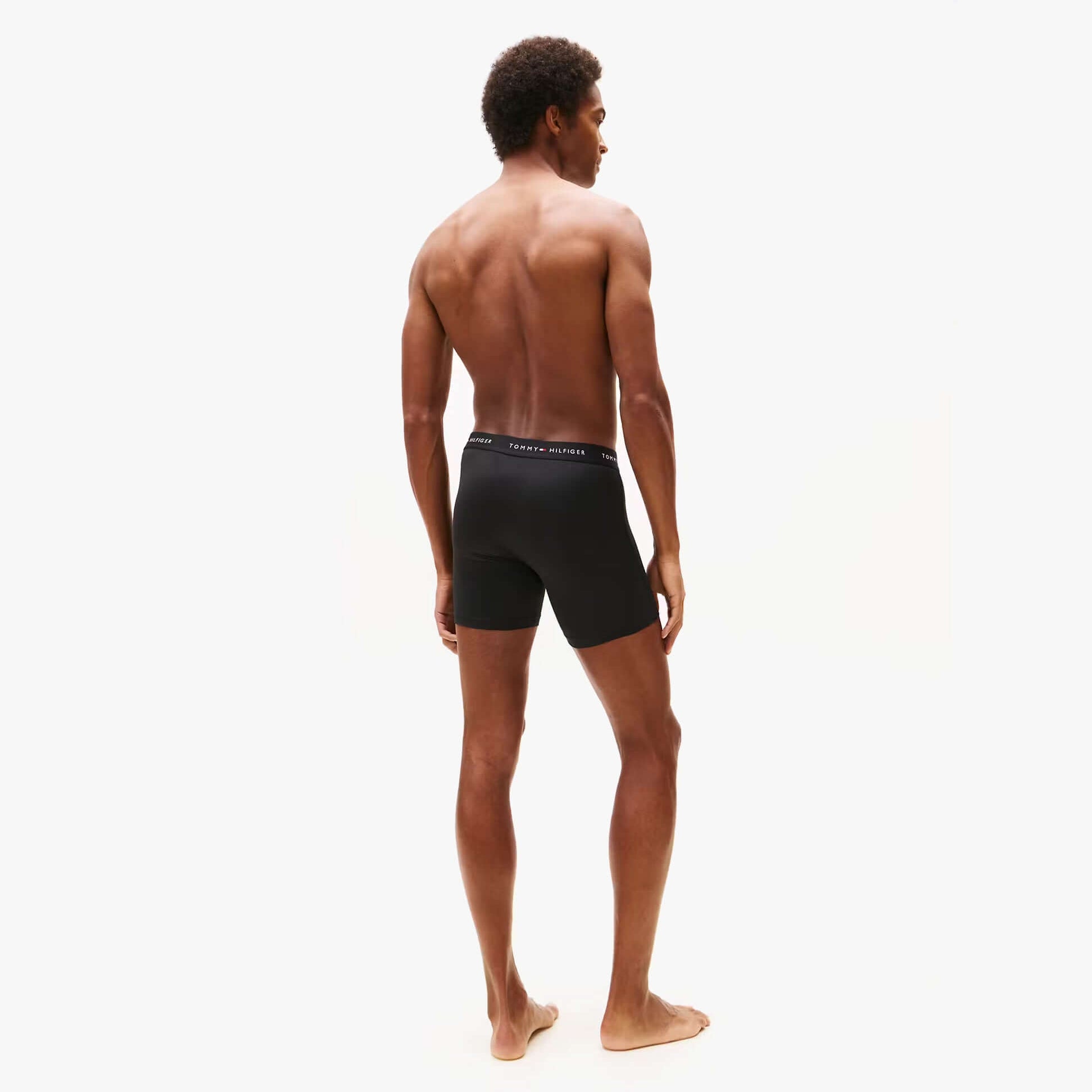 Tommy Hilfiger Mens Signature Microfibre 3 Pack Boxer Briefs Black, back view on model with bare skin.