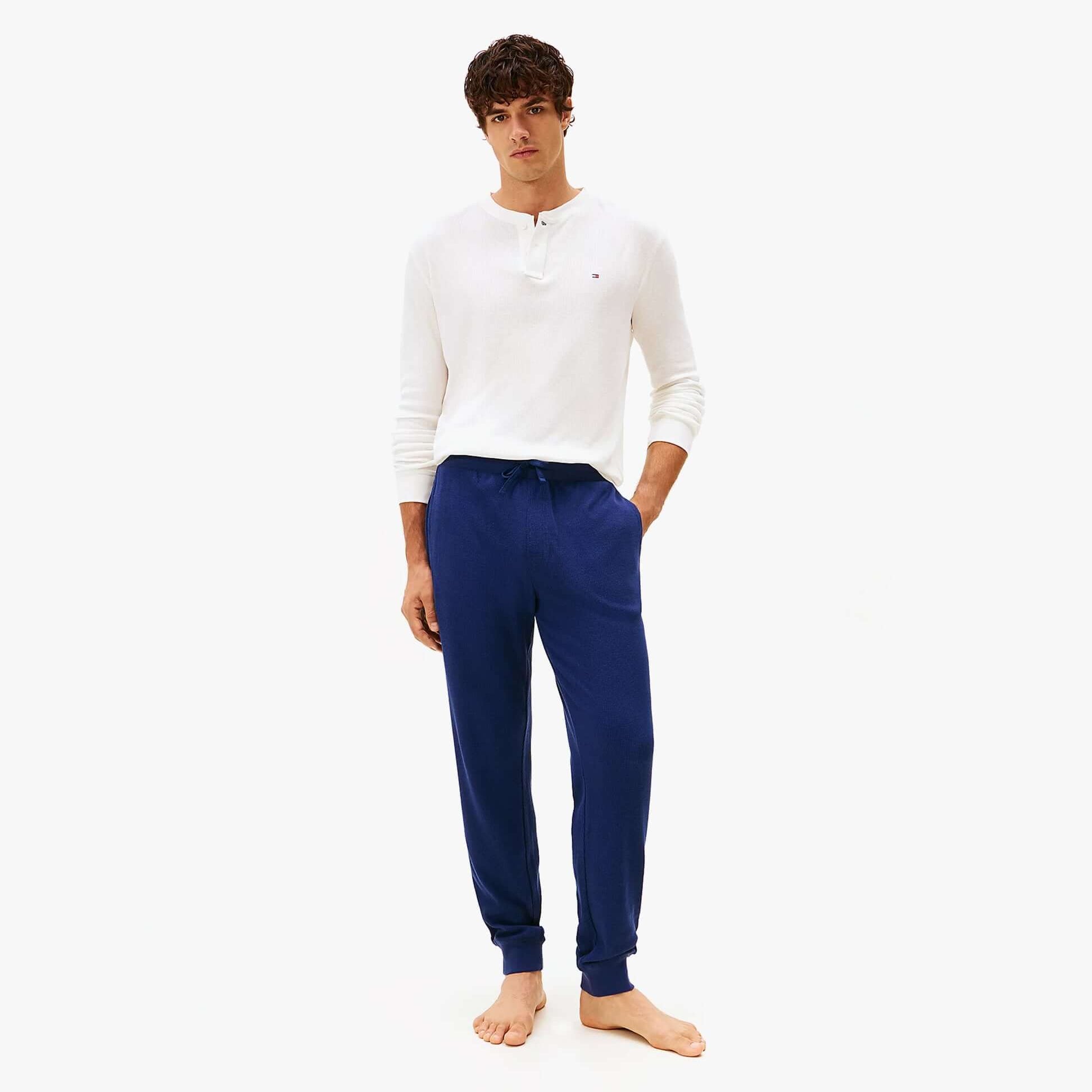 Tommy Hilfiger WAFFLE PANT Mens Cuffed Joggers Navy front view on a model, showcasing style and comfort.