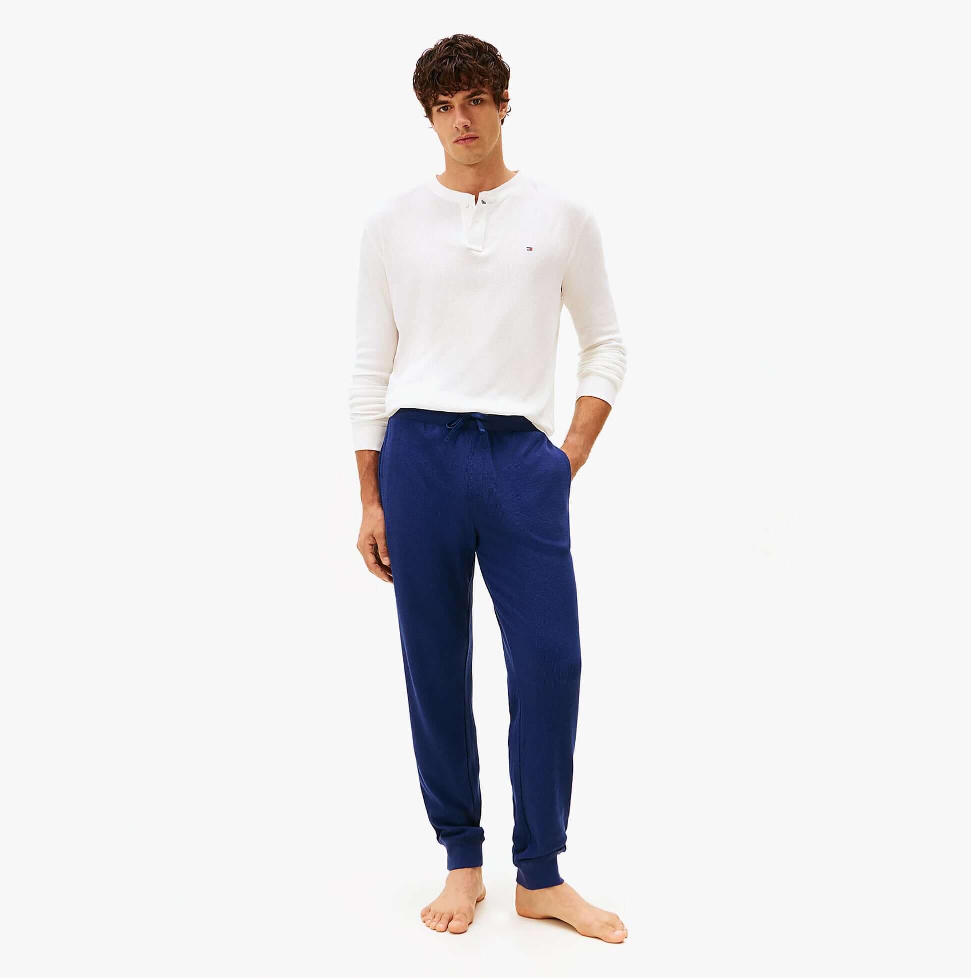 Tommy Hilfiger WAFFLE PANT Mens Cuffed Joggers Navy front view on a model, showcasing style and comfort.