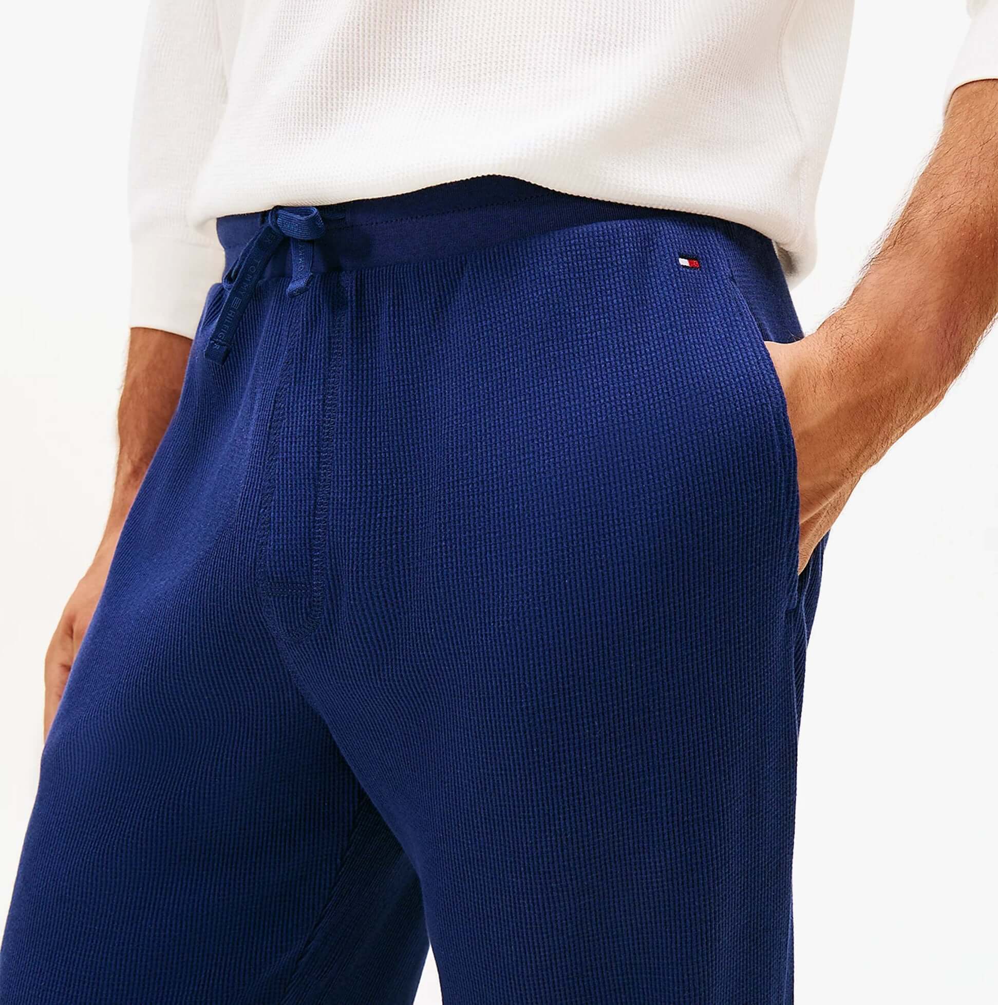 Tommy Hilfiger WAFFLE PANT Mens Cuffed Joggers Navy detail view showing fabric and pockets.