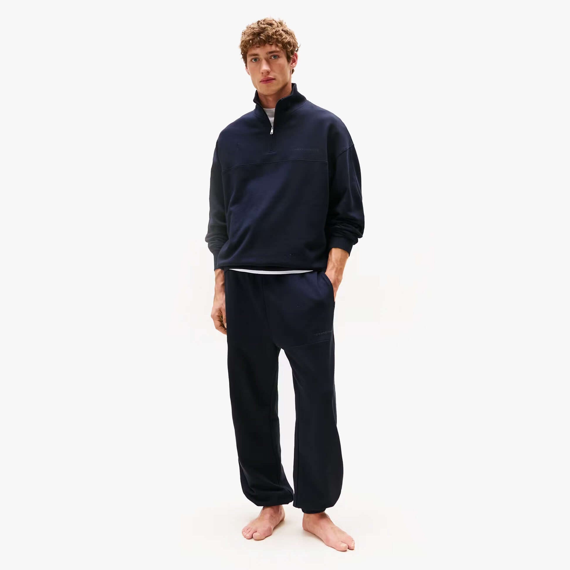 Tommy Hilfiger HALF ZIP Mens Sweatshirts Desert Sky front view showcasing a stylish sweatshirt in a deep navy color.