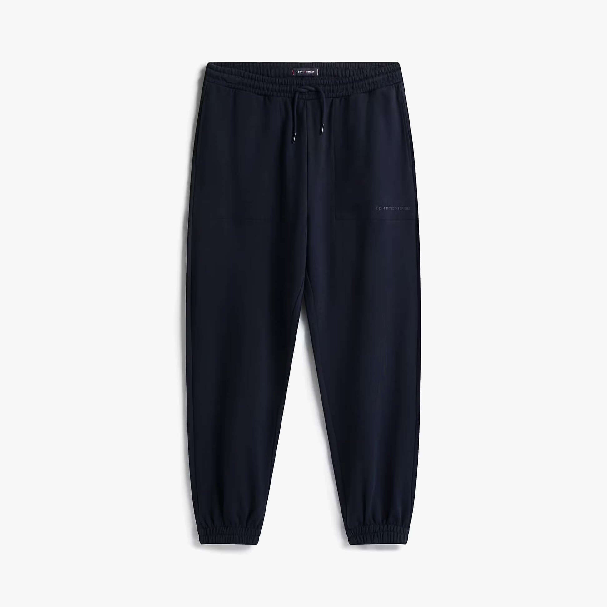 Tommy Hilfiger TRACK PANT Mens Desert Sky front view showing elastic waistband and tapered cuffs.