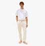 Tommy Hilfiger TH Original Mens Logo Lounge Joggers Off White Newsprint front view, stylish design, comfortable fit.