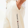 Tommy Hilfiger TH Original Mens Logo Lounge Joggers Off White Newsprint detail view of joggers showing logo and pocket.