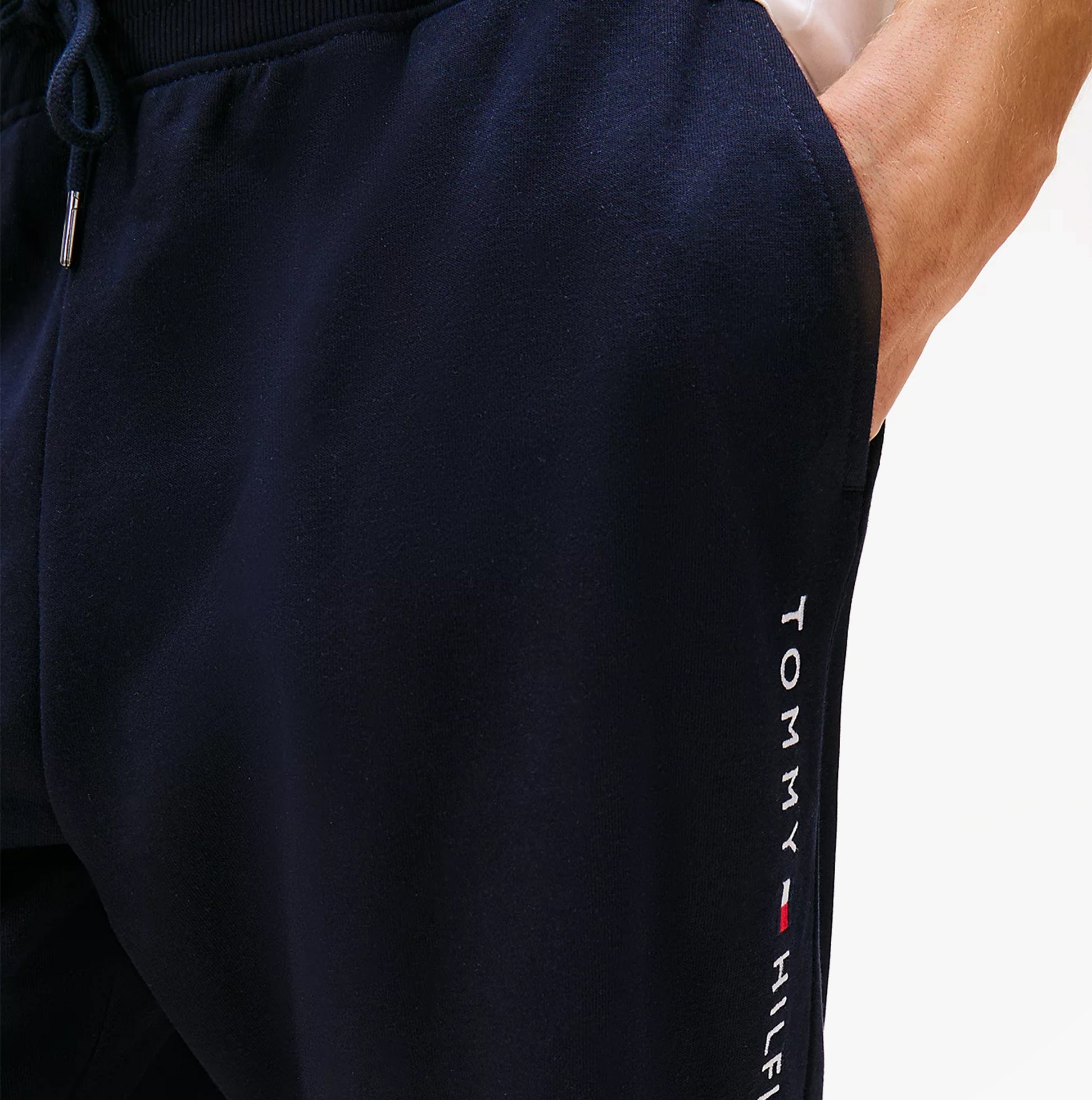 Tommy Hilfiger TH Original Mens Logo Lounge Joggers Desert Sky detail view showcasing logo on side pocket.