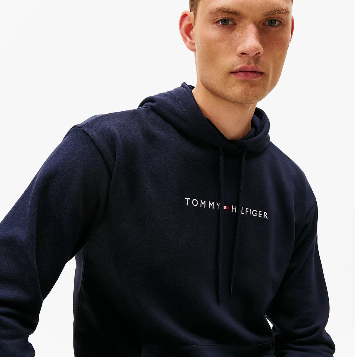 Tommy Hilfiger TH Original Logo Drawstring Lounge Hoodie Desert Sky front view model wearing hoodie in desert sky color