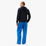 Tommy Hilfiger TH Original Logo Drawstring Lounge Hoodie Desert Sky back view with blue checkered pants.