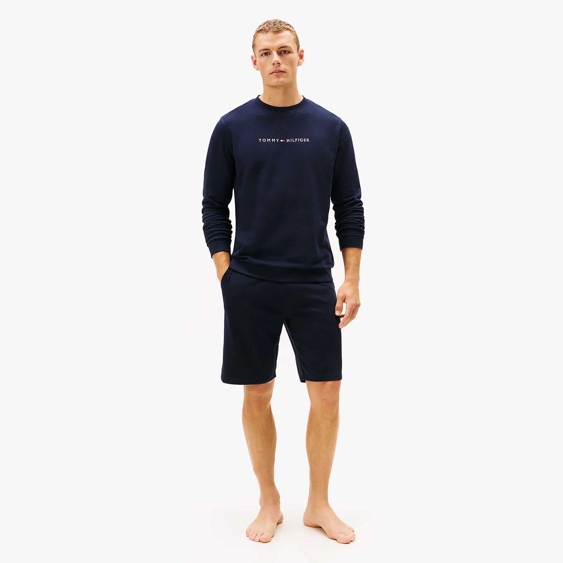 Tommy Hilfiger TRACK TOP Mens Sweatshirts Desert Sky front view model wearing sweatshirt and shorts in navy blue