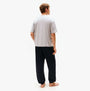 Tommy Hilfiger SS TEE CONT. LOGO Mens T-Shirts & Tank Tops Light Grey Heather back view on model wearing black pants.