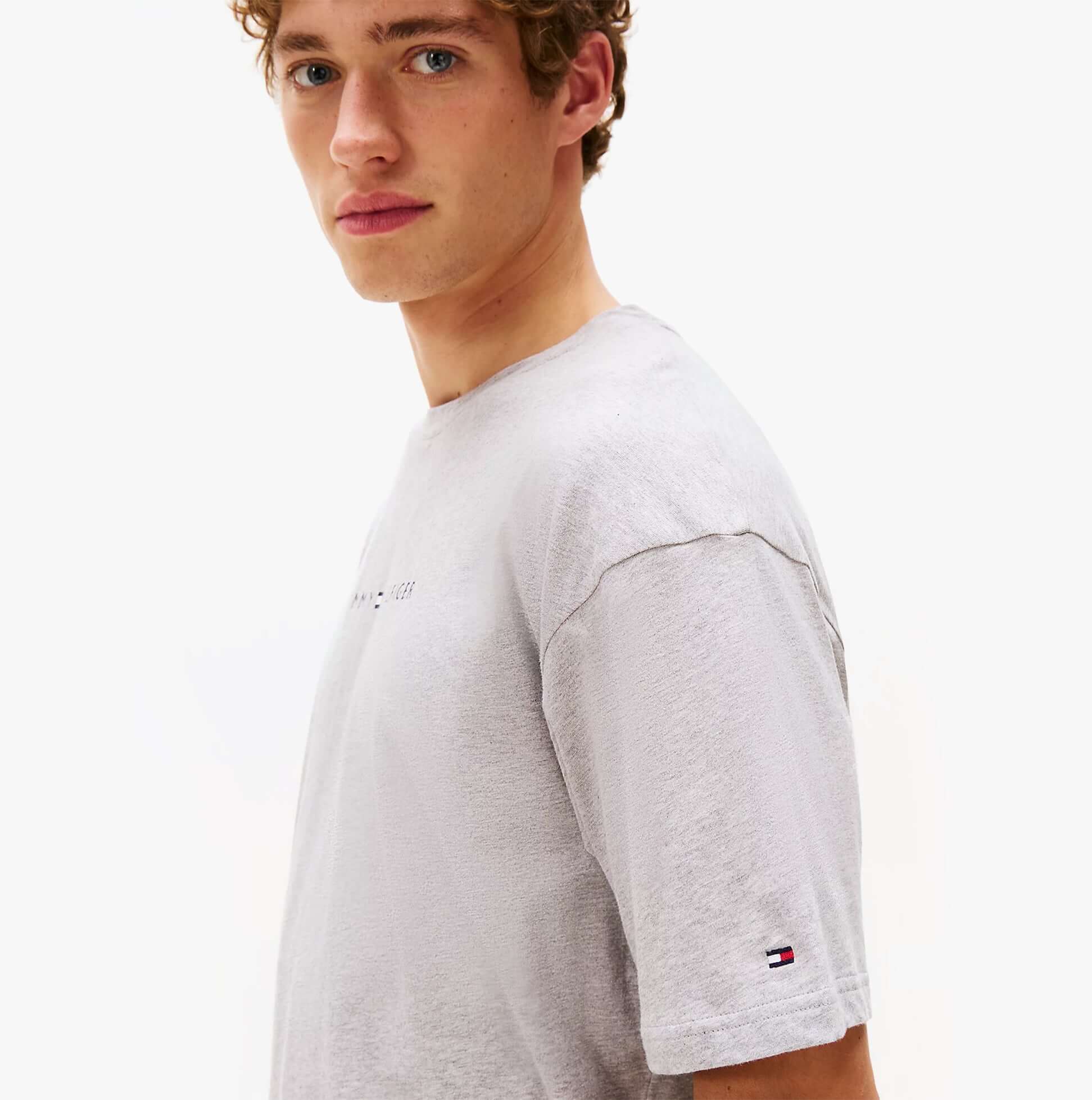 Tommy Hilfiger SS TEE CONT. LOGO Mens T-Shirts & Tank Tops Light Grey Heather side view model wearing t-shirt.