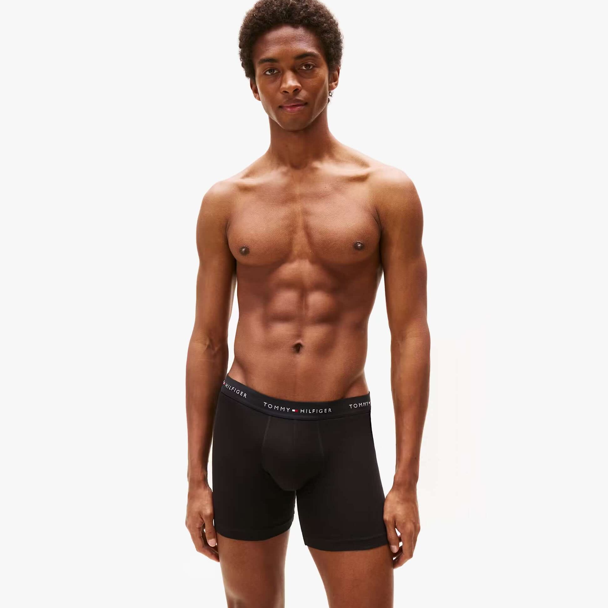 Tommy Hilfiger 3 Pack Mens BOXER BRIEF Black front view on model showcasing fit and design features.