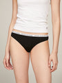 Tommy Hilfiger THONG 3 Pack Womens Black side view of thong underwear with logo waistband.