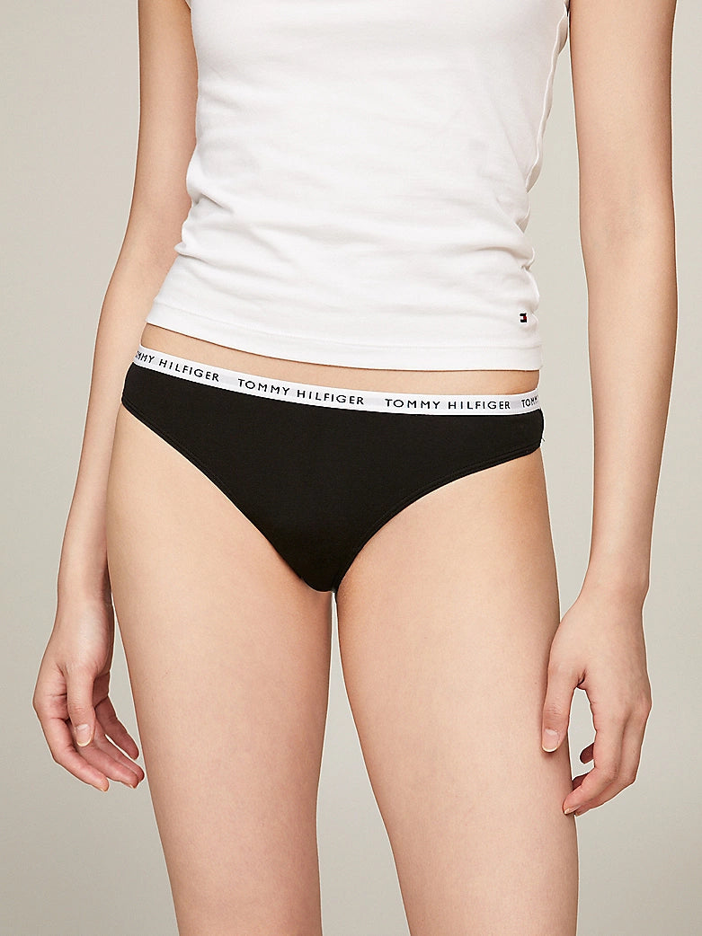 Tommy Hilfiger THONG 3 Pack Womens Black side view of thong underwear with logo waistband.