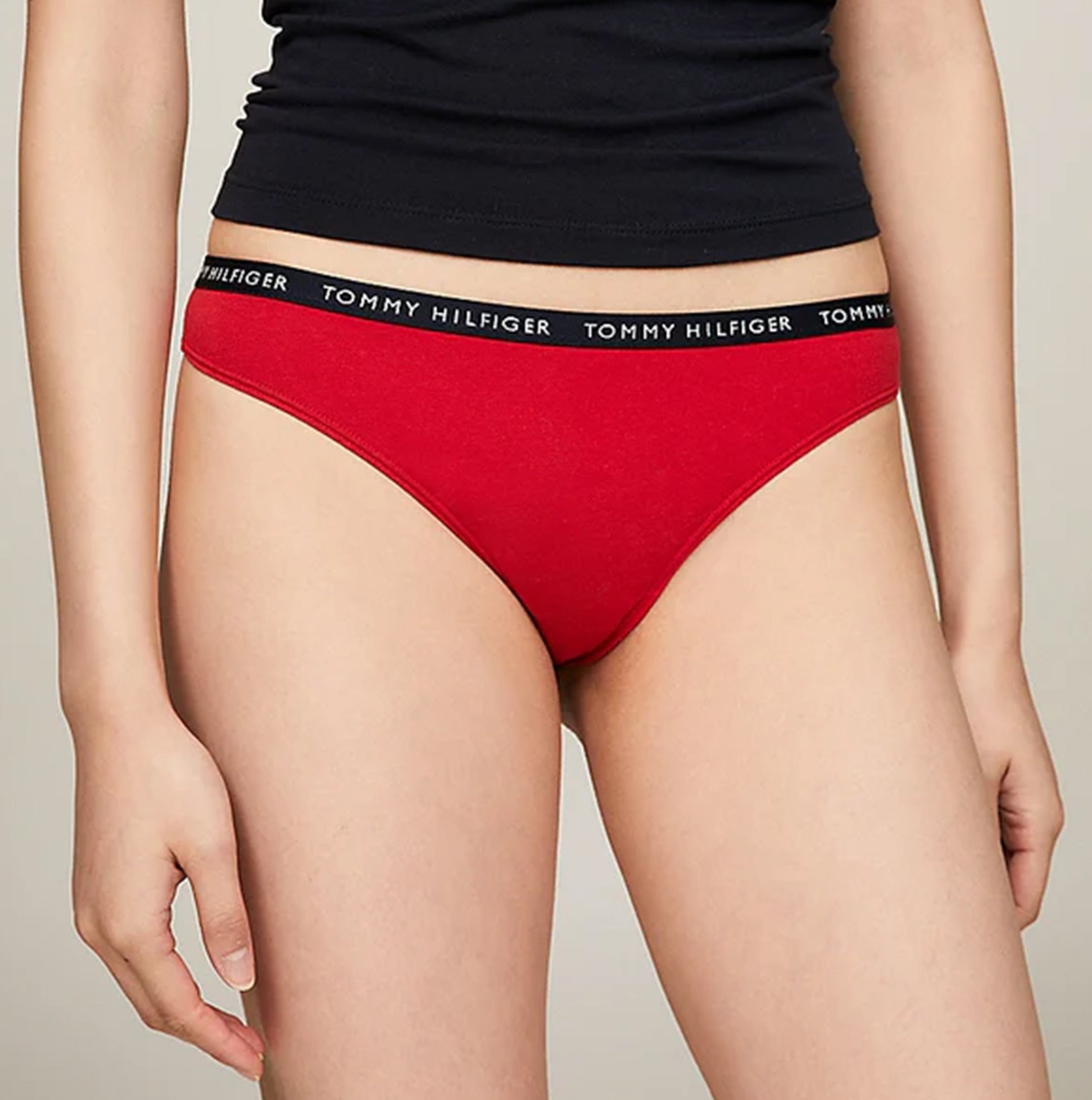 Tommy Hilfiger THONG 3 Pack Womens White/Desert Sky/Primary Red front view showing red thong with logo waistband.
