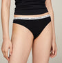 Tommy Hilfiger THONG 3 Pack Womens White/Desert Sky/Primary Red front view of black thong with logo waistband.