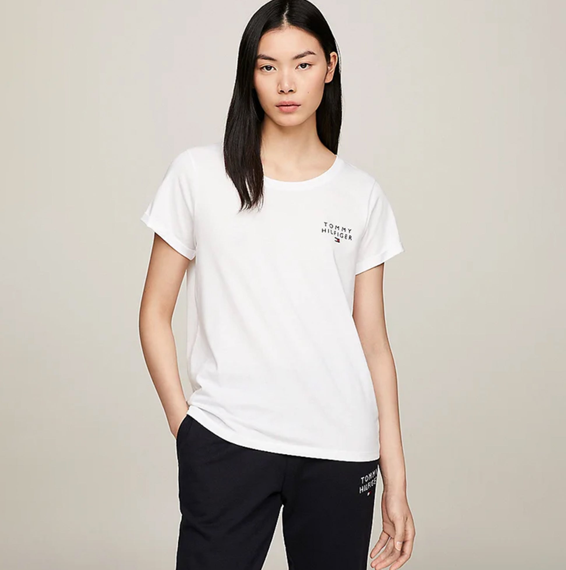 Tommy Hilfiger PURE COTTON Womens T-Shirt White front view model wearing crew neck t-shirt with TH logo.