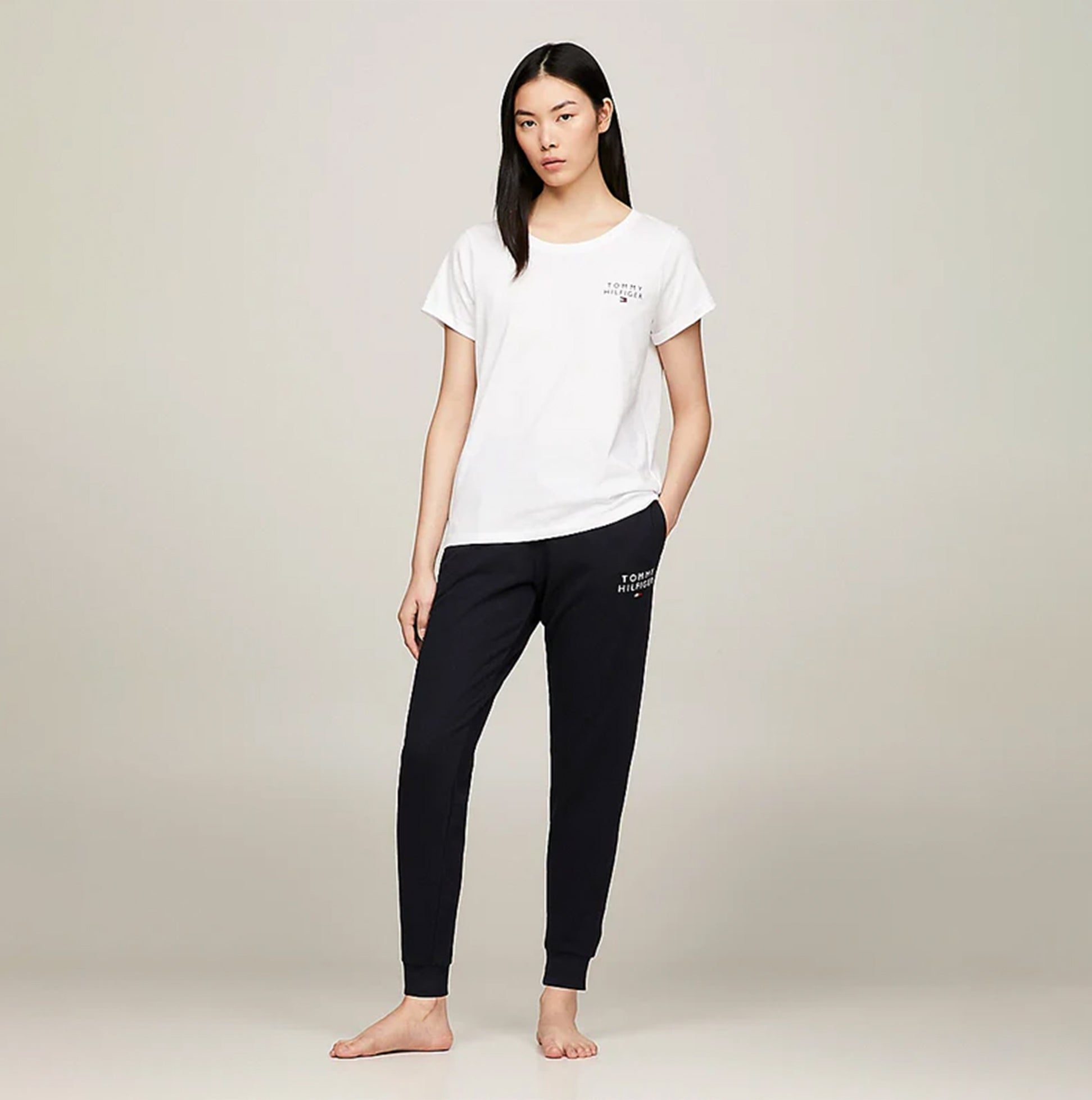 Tommy Hilfiger PURE COTTON Womens T-Shirt White front view worn with navy pants, showcasing comfort and style.