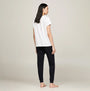 Tommy Hilfiger PURE COTTON Womens T-Shirt White back view worn with black pants on model.