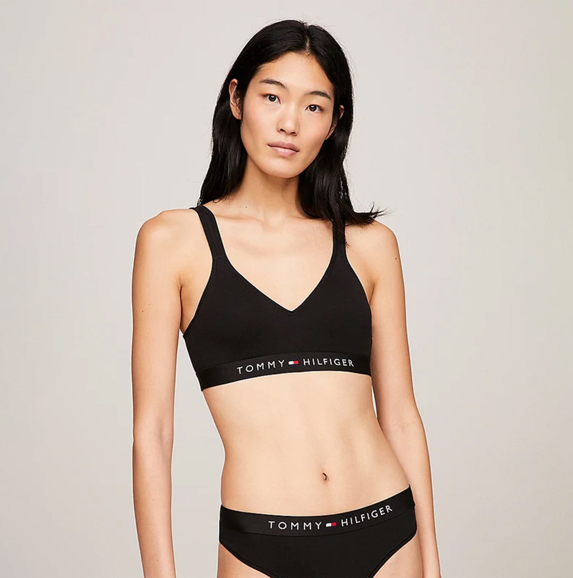 Tommy Hilfiger BRALETTE LIFT Womens Black front view, featuring a V-neck design with a logo band.