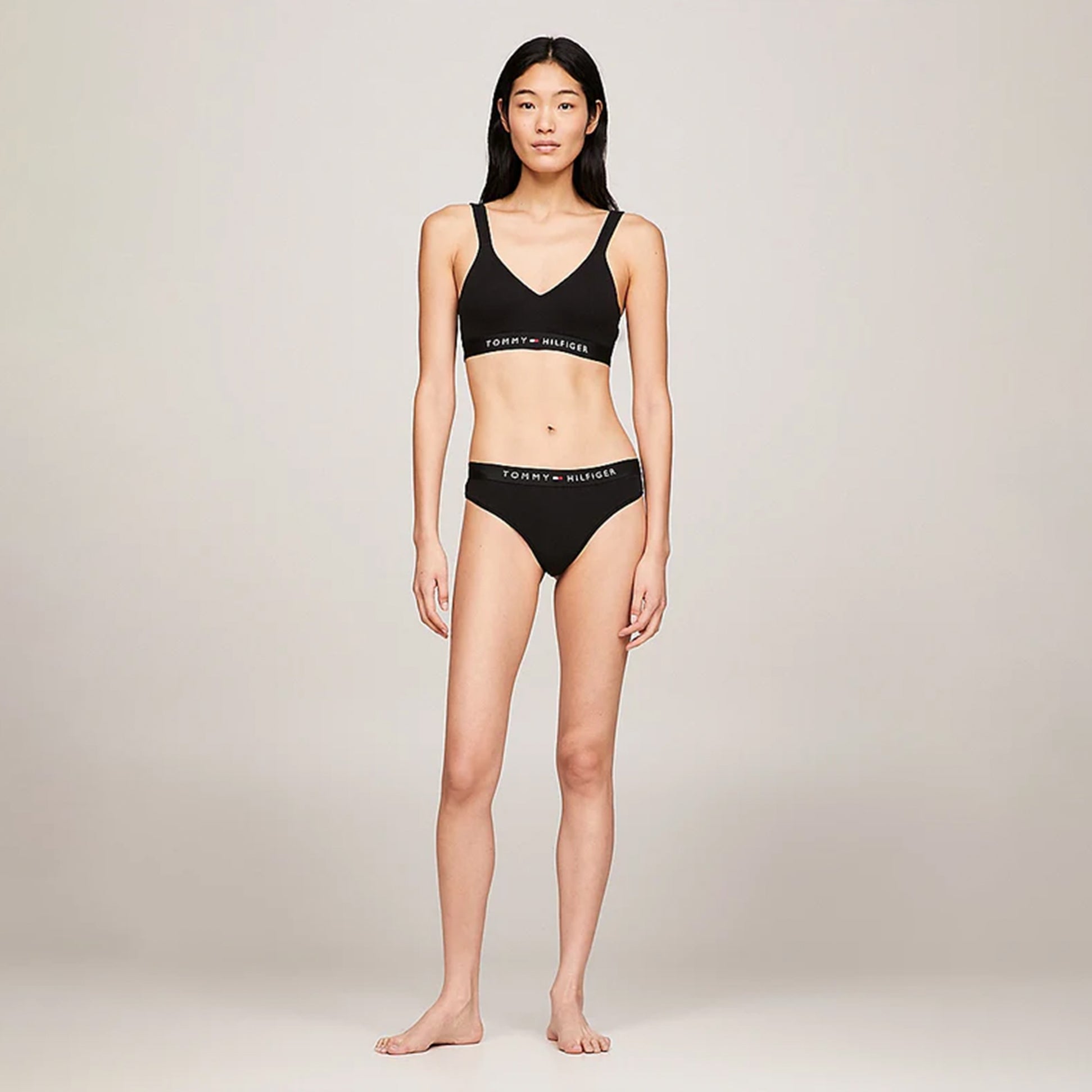 Tommy Hilfiger BRALETTE LIFT Womens Black front view showcasing a model wearing the black bralette with matching underwear.