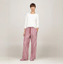 Tommy Hilfiger ORIGINAL Womens Flannel Pan Ivory/Pinstripe Rouge front view model wearing long sleeve top and striped pants
