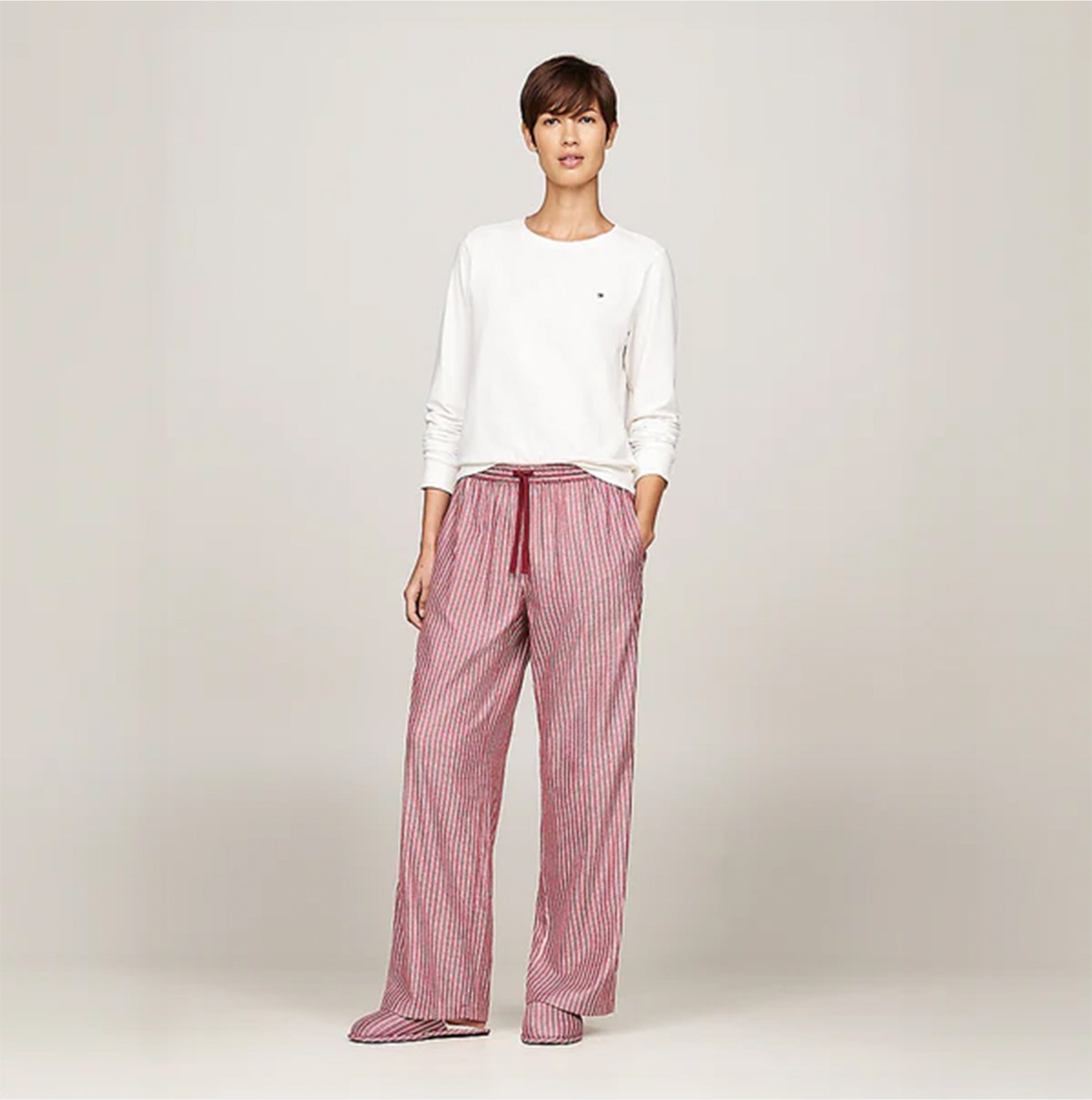 Tommy Hilfiger ORIGINAL Womens Flannel Pan Ivory/Pinstripe Rouge front view model wearing long sleeve top and striped pants