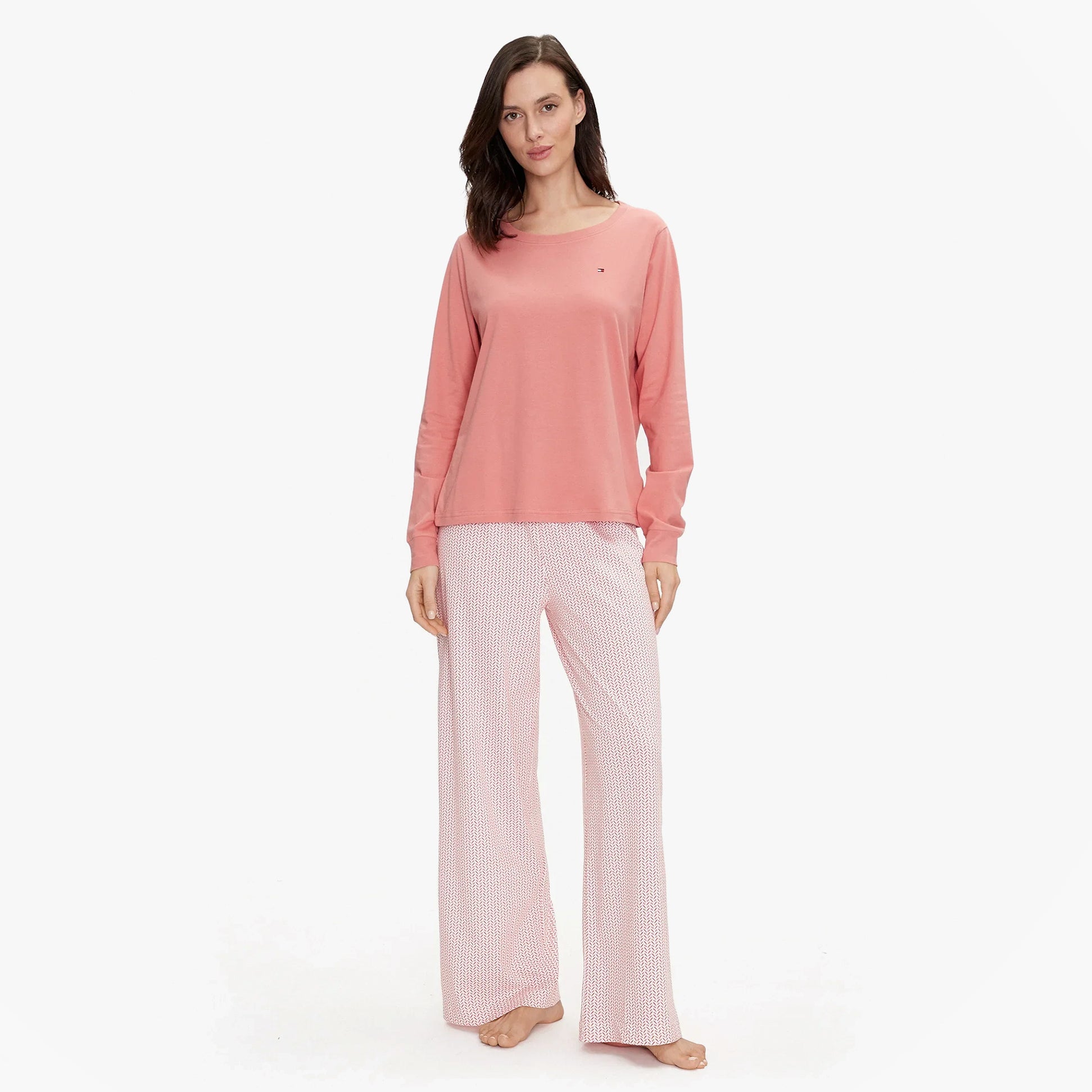 Tommy Hilfiger TH ICON Long Sleeve Jersey Pyjama Set Womens Coral Clay / Mini Geo Pink, front view, model wearing long sleeve top and pajama pants.