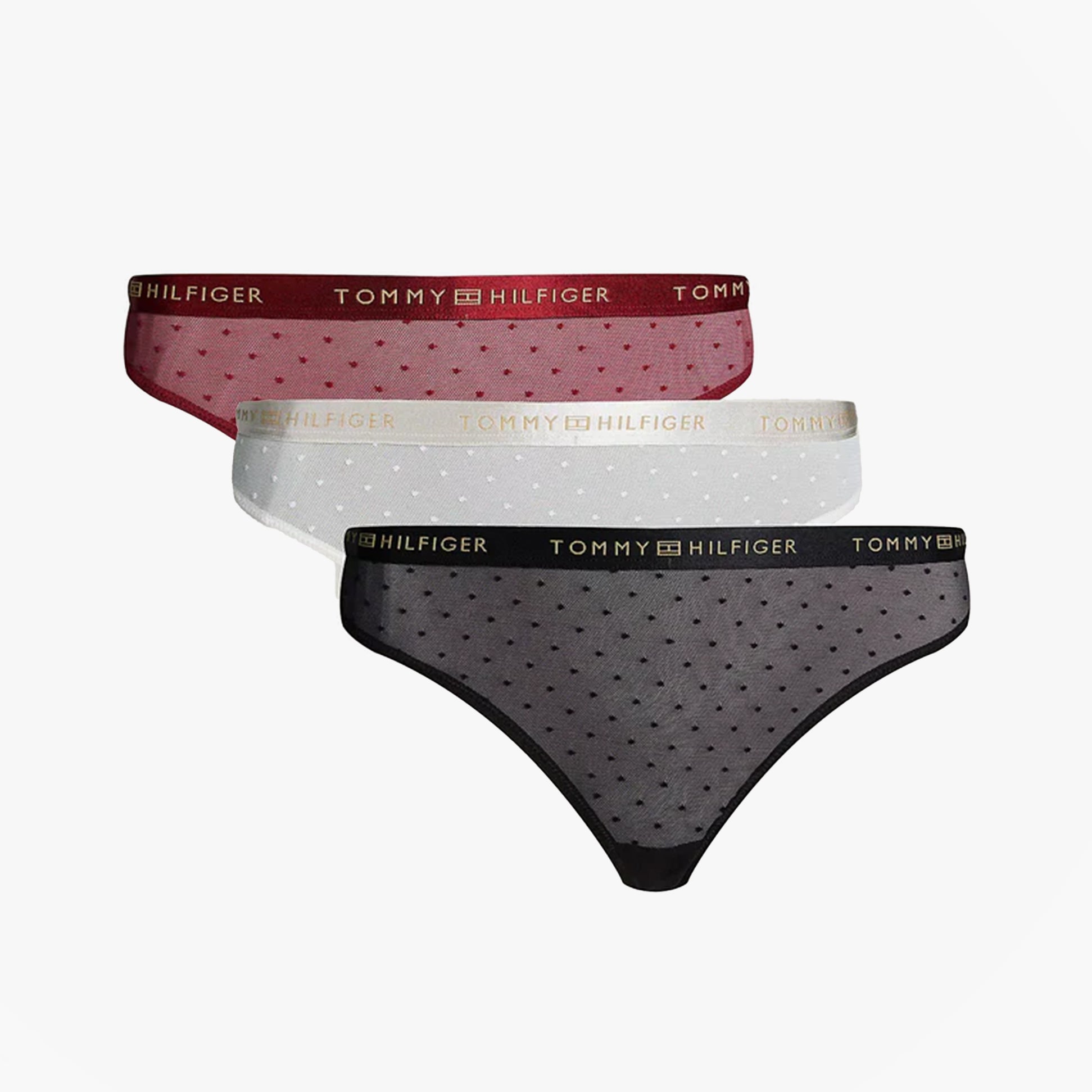 Tommy Hilfiger GIFT UNDERWEAR Womens 3 Pack Thongs Multicoloured side view of red, white, and black thongs with logo waistband.