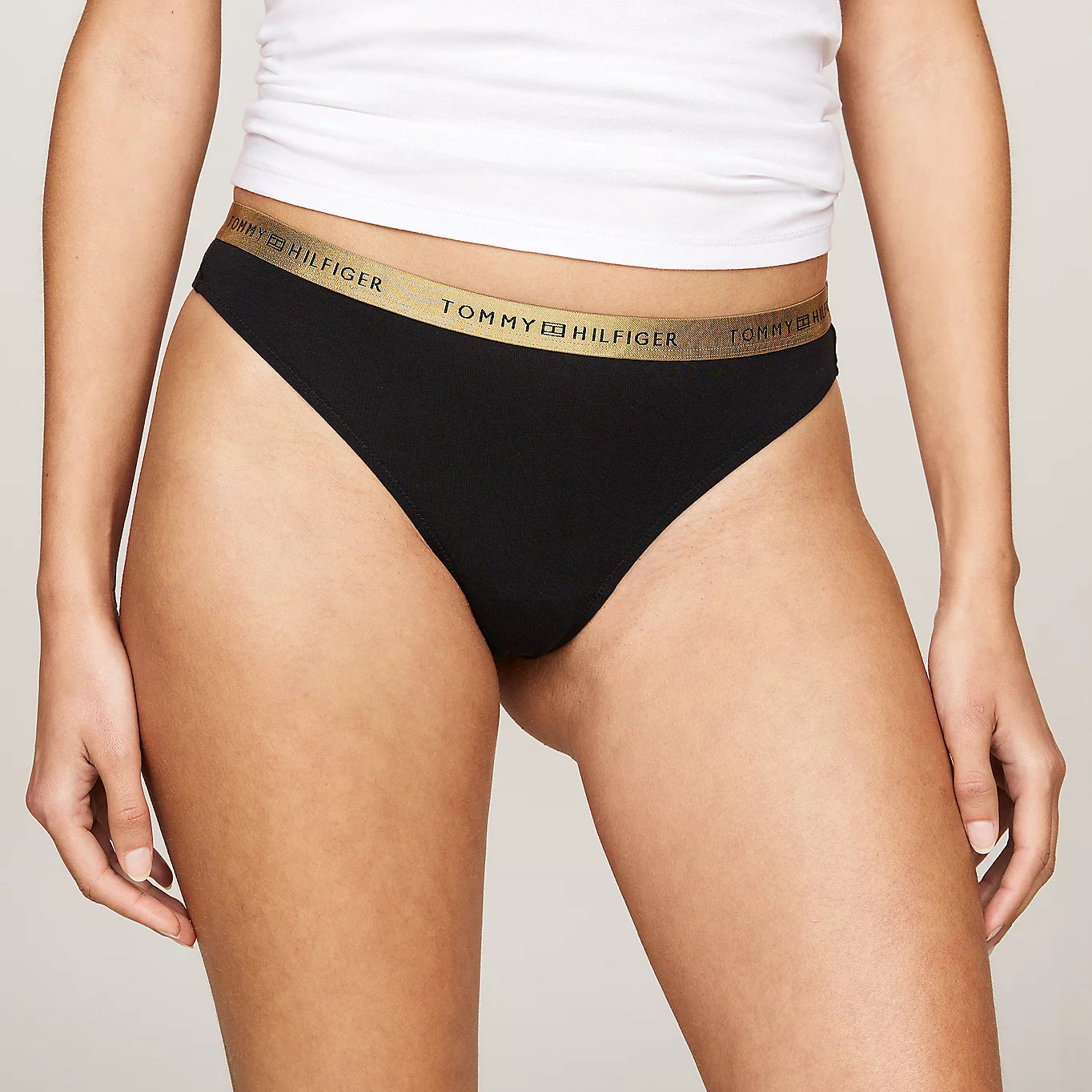 Tommy Hilfiger GIFT UNDERWEAR Womens 5 Pack Thongs Multicoloured front view of black thong with logo waistband.