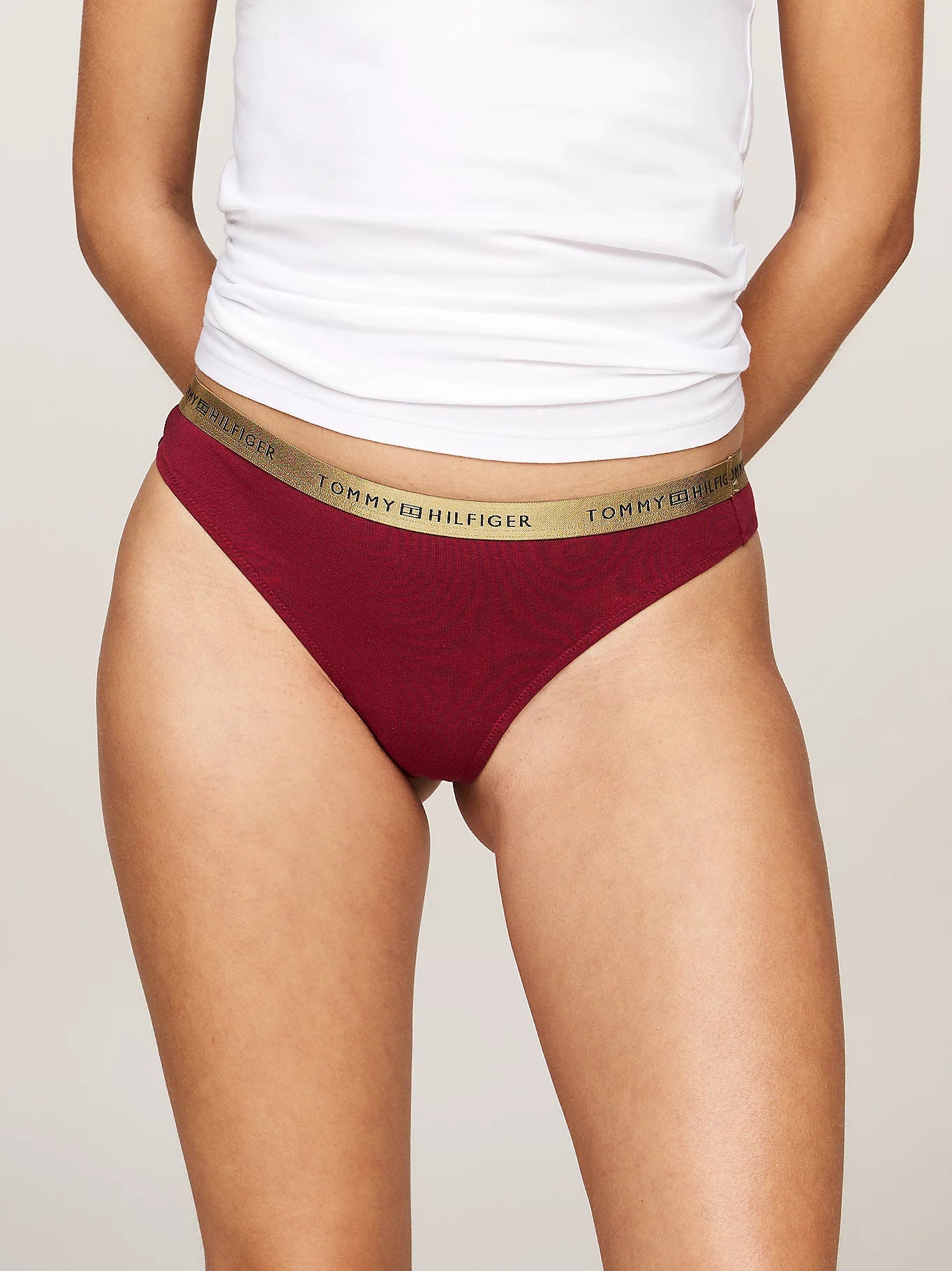 Tommy Hilfiger GIFT UNDERWEAR Womens 5 Pack Thongs Multicoloured side view of burgundy thong with logo waistband